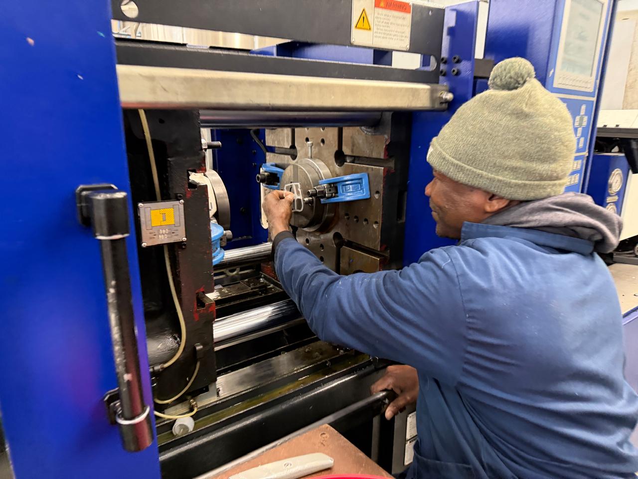Injection moulding machine in operation